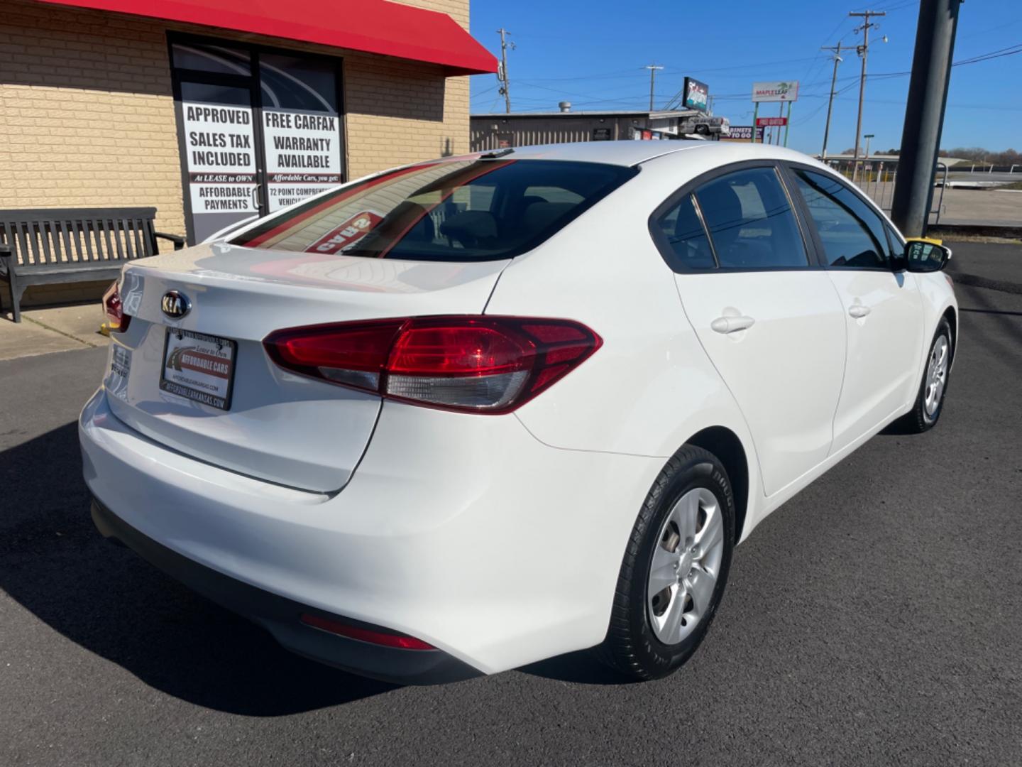 2017 White Kia Forte (3KPFK4A7XHE) with an 4-Cyl, 2.0 Liter engine, Automatic, 6-Spd transmission, located at 8008 Warden Rd, Sherwood, AR, 72120, (501) 801-6100, 34.830078, -92.186684 - Photo#7